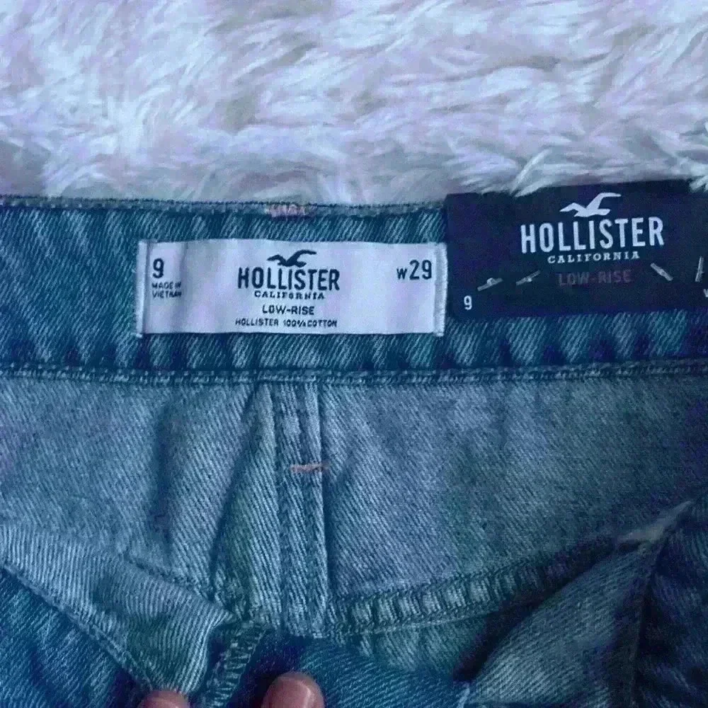 Hollister Denim Mini Skirt.  Size 9/waist 29.  Distressed w frayed edging. NWT.